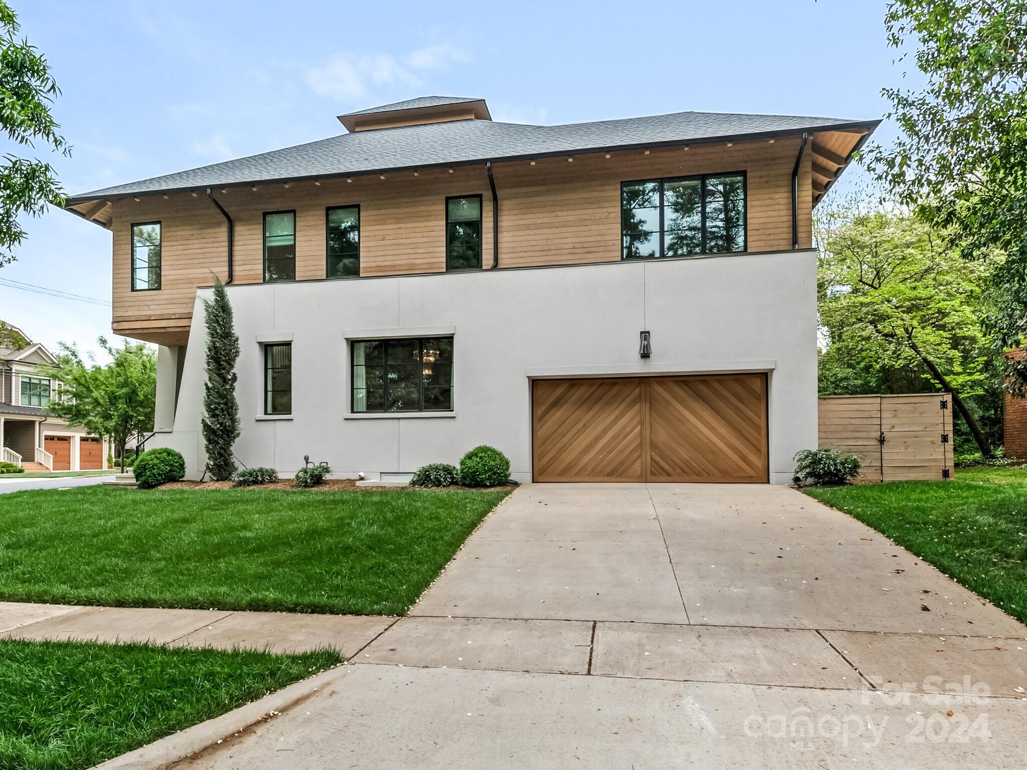 2717 Westfield Road Charlotte, NC 28209 - Photo 2 of 32 a front view of a house with yard