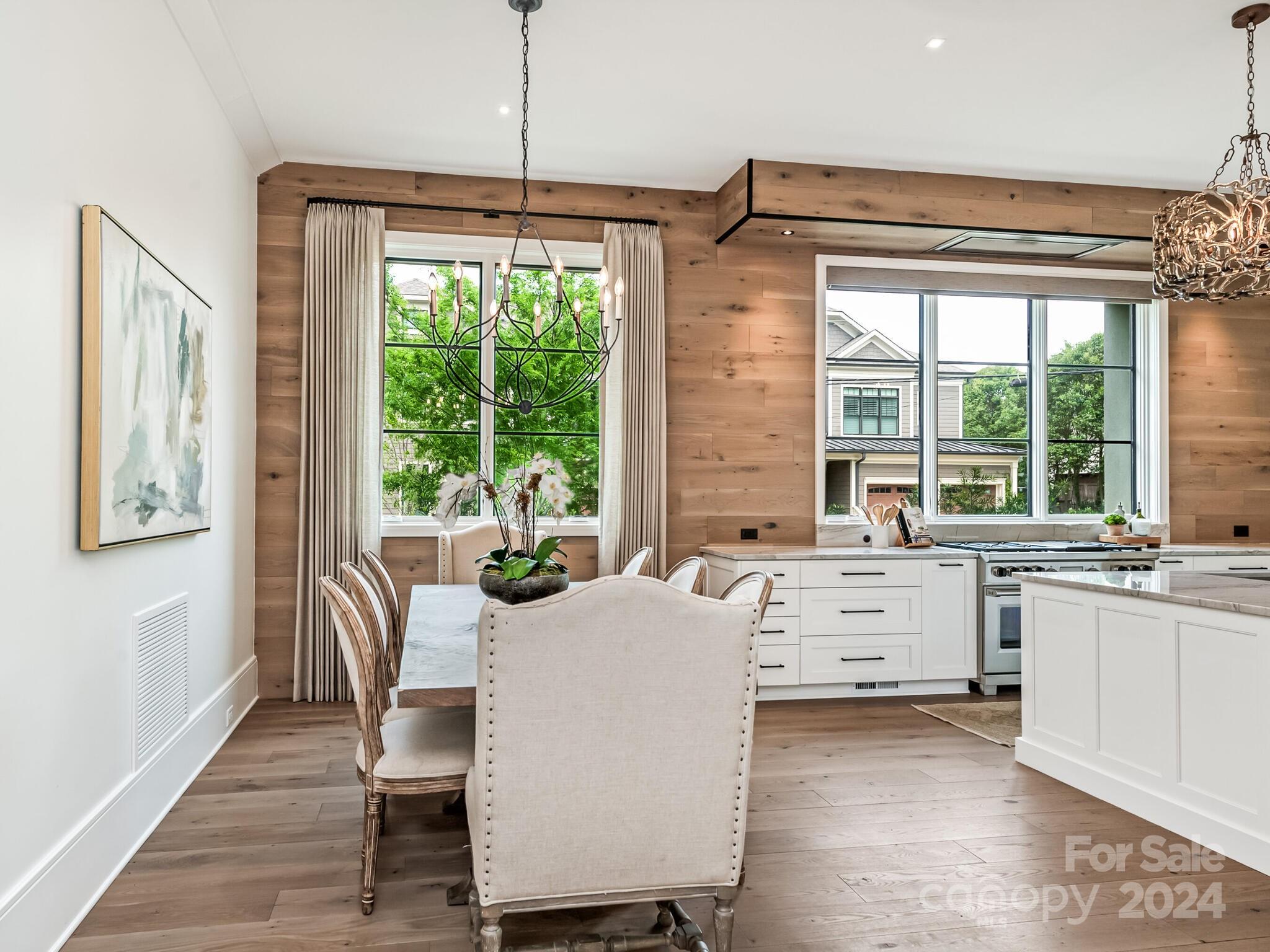 2717 Westfield Road Charlotte, NC 28209 - Photo 6 of 32 a room with furniture a large window and a rug