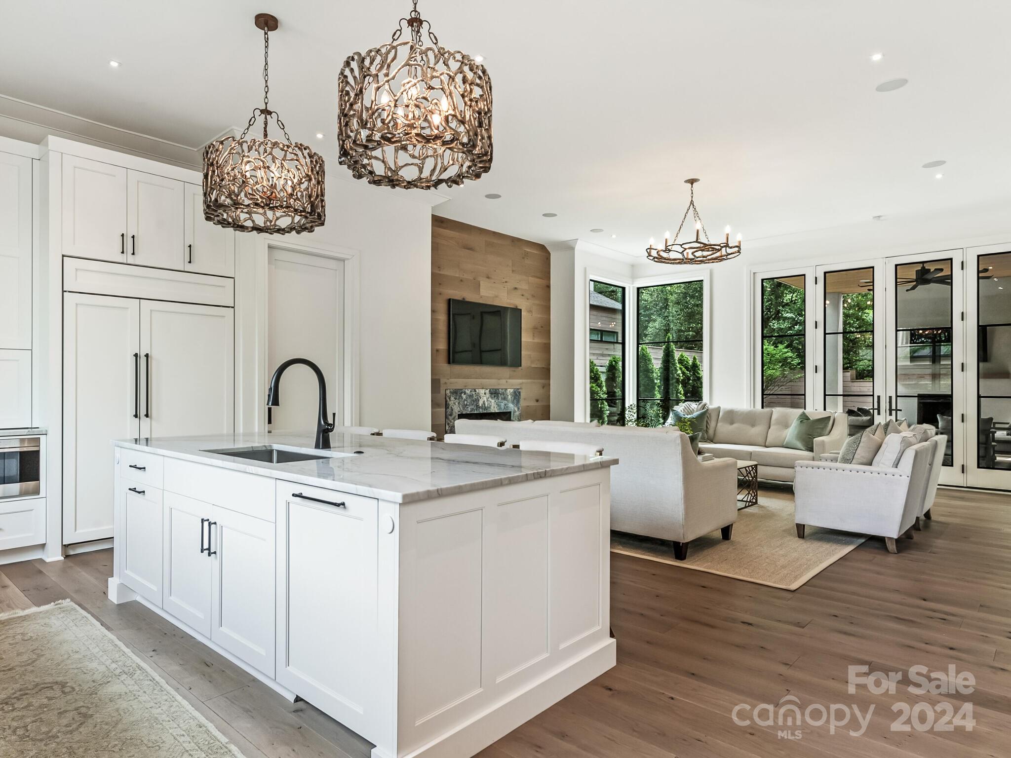 2717 Westfield Road Charlotte, NC 28209 - Photo 9 of 32 a very nice looking dining room with kitchen island furniture and a chandelier