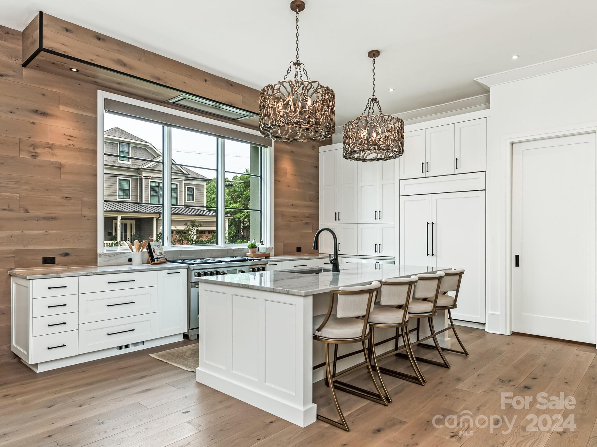 2717 Westfield Road Charlotte, NC 28209 - Photo 10 of 32 a kitchen with granite countertop cabinets a dining table and chairs