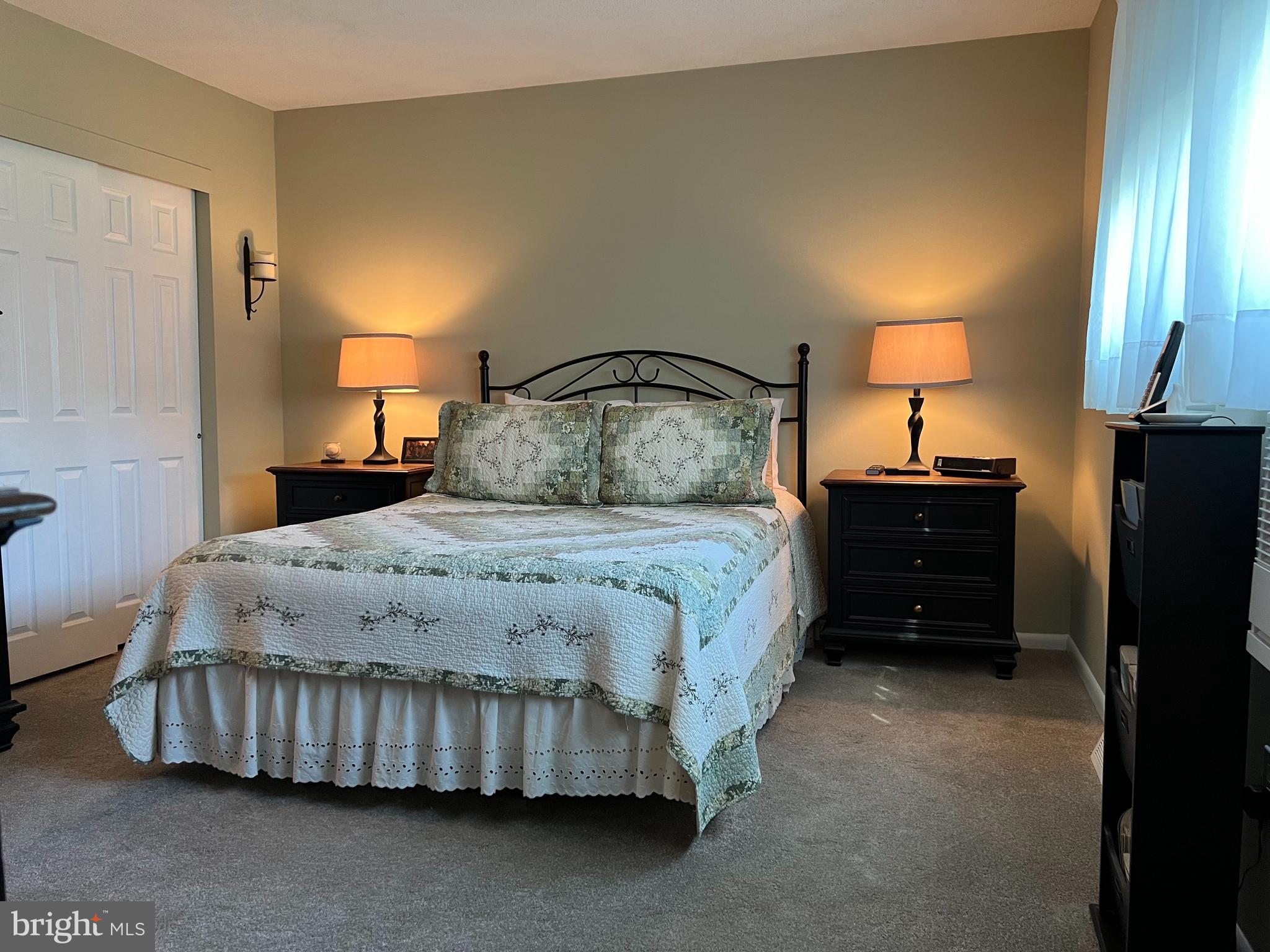 3814 Inwood Lane Philadelphia, PA 19154 - Photo 18 of 37 a bedroom with a bed and a lamp