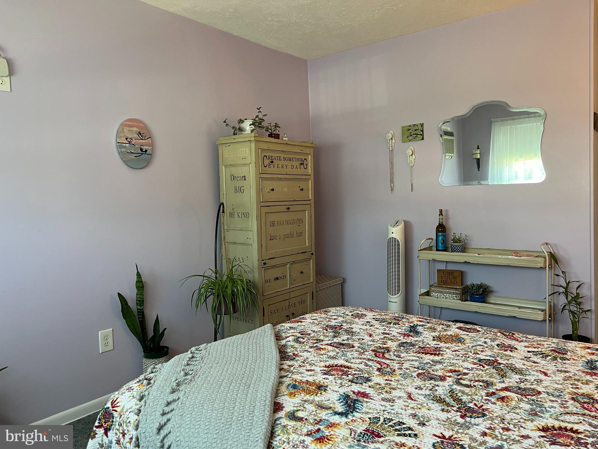 3814 Inwood Lane Philadelphia, PA 19154 - Photo 20 of 37 a bedroom with a bed and a potted plant