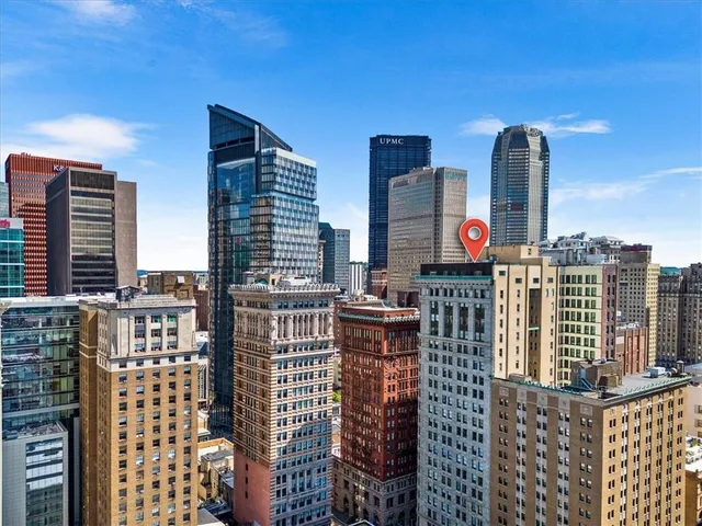 a front view of a building with outdoor space