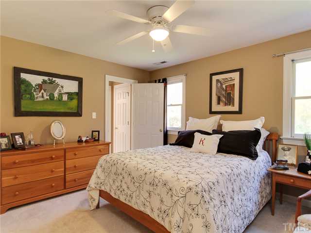 408 Reedham Way Raleigh, NC 27615 - Photo 19 of 25 Guest bedroom has bathroom and nice closet space.