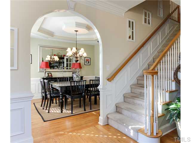 408 Reedham Way Raleigh, NC 27615 - Photo 3 of 25 Nice large foyer that opens to dining room and living room.
