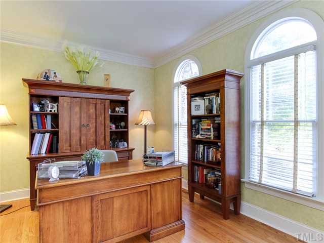408 Reedham Way Raleigh, NC 27615 - Photo 4 of 25 Nice bright living room on front of house. Sellers are using this as a study.