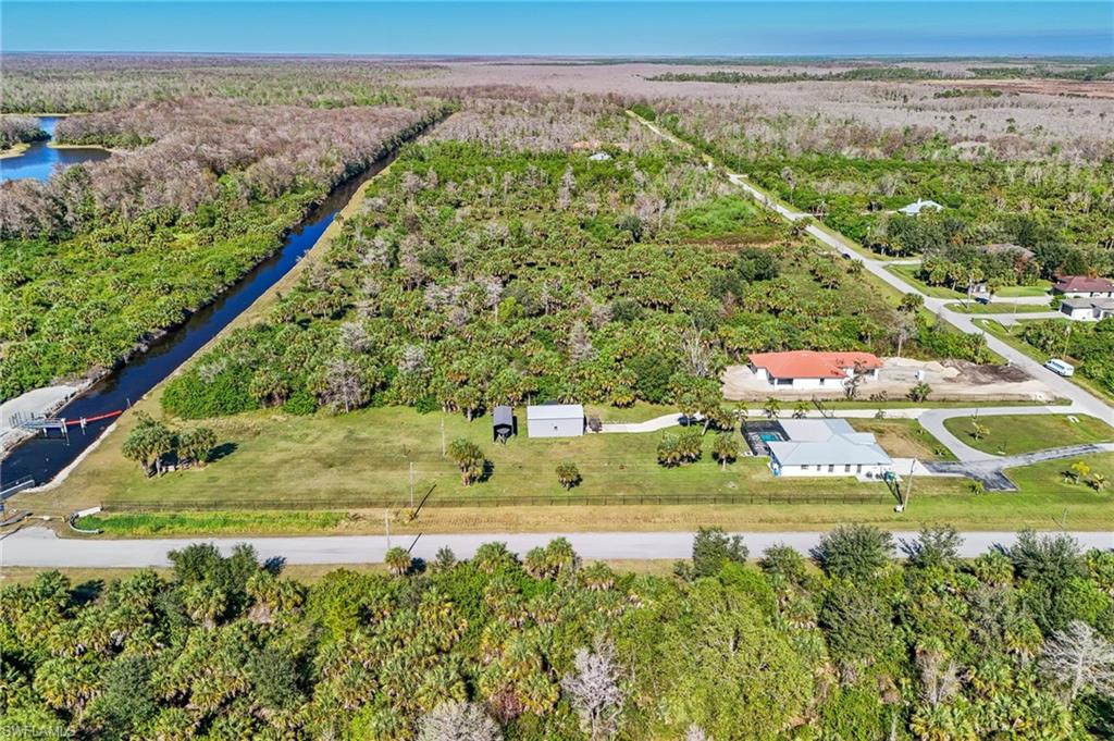 Wilson Boulevard North Naples, FL 34120 - Photo 4 of 8 a view of a yard with an outdoor seating