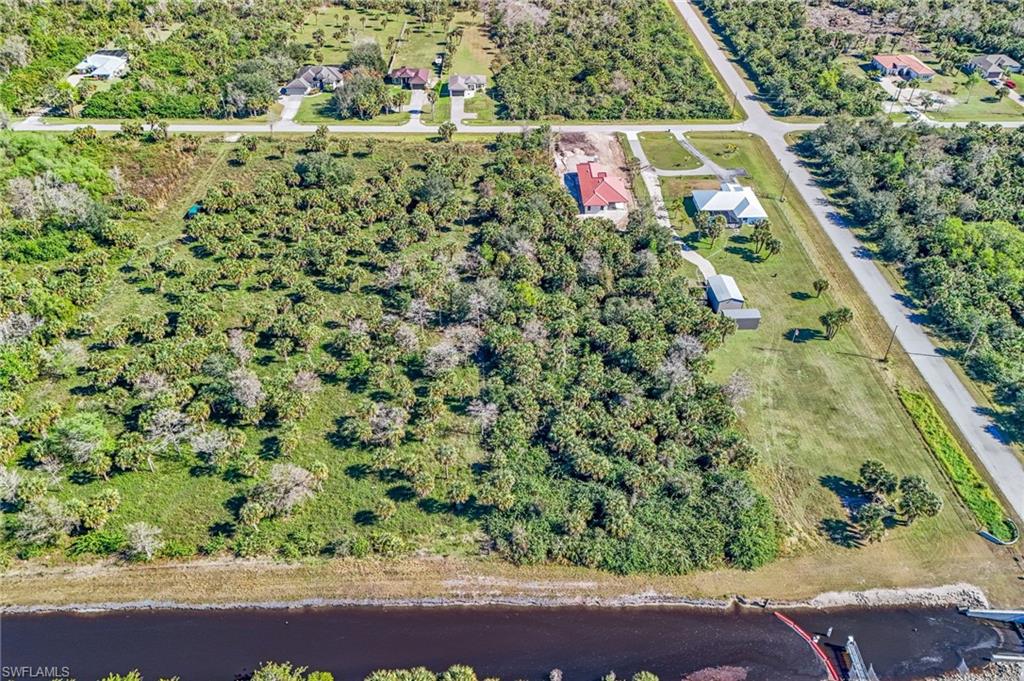 Wilson Boulevard North Naples, FL 34120 - Photo 8 of 8 an aerial view of a residential houses
