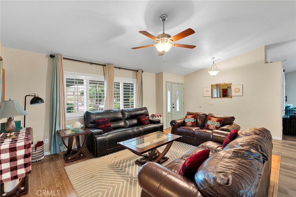 17777 Brazier Drive Riverside, CA 92508 - Photo 11 of 58 a living room with furniture ceiling fan and a window