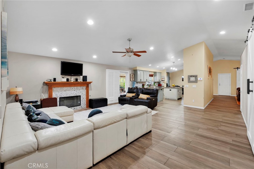 17777 Brazier Drive Riverside, CA 92508 - Photo 17 of 58 a living room with furniture and a flat screen tv