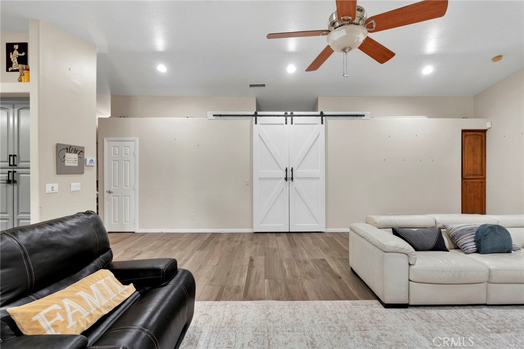 17777 Brazier Drive Riverside, CA 92508 - Photo 18 of 58 a living room with furniture and a ceiling fan