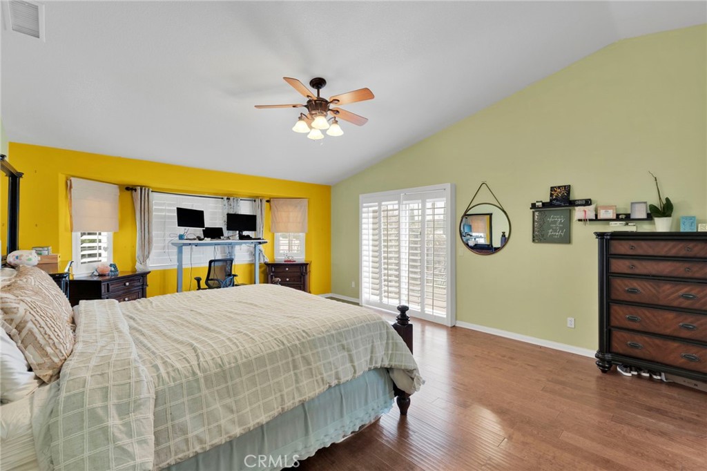 17777 Brazier Drive Riverside, CA 92508 - Photo 19 of 58 a bedroom with a bed and a chandelier