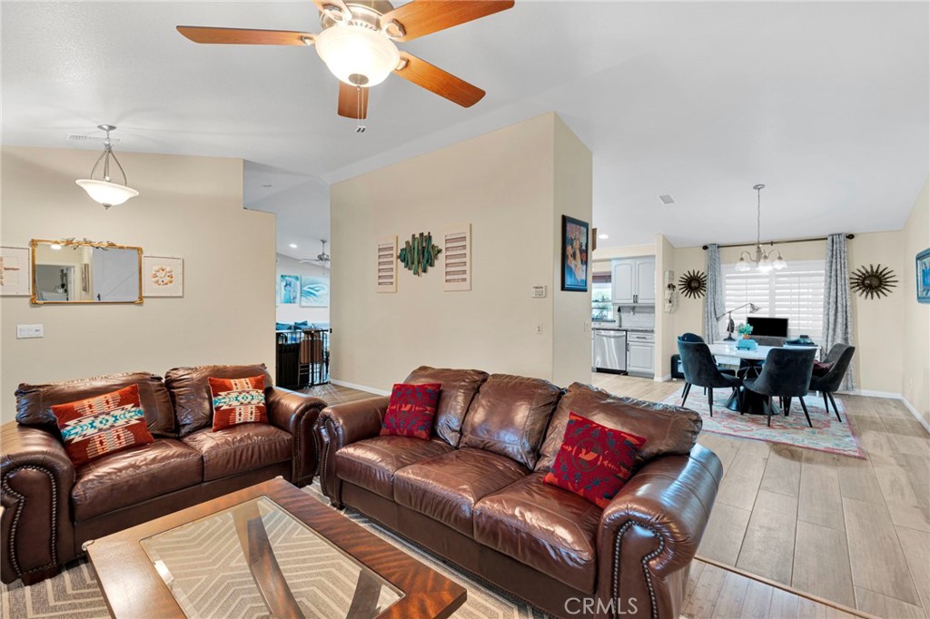 17777 Brazier Drive Riverside, CA 92508 - Photo 2 of 58 a living room with furniture and a chandelier