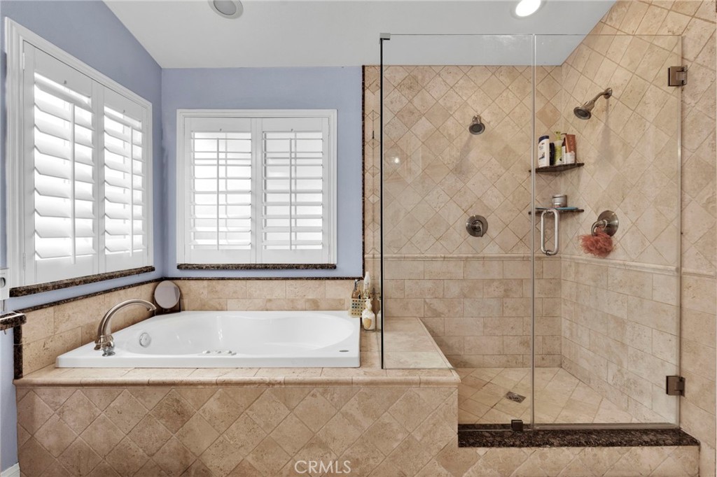 17777 Brazier Drive Riverside, CA 92508 - Photo 22 of 58 a white bath tub sitting next to a shower