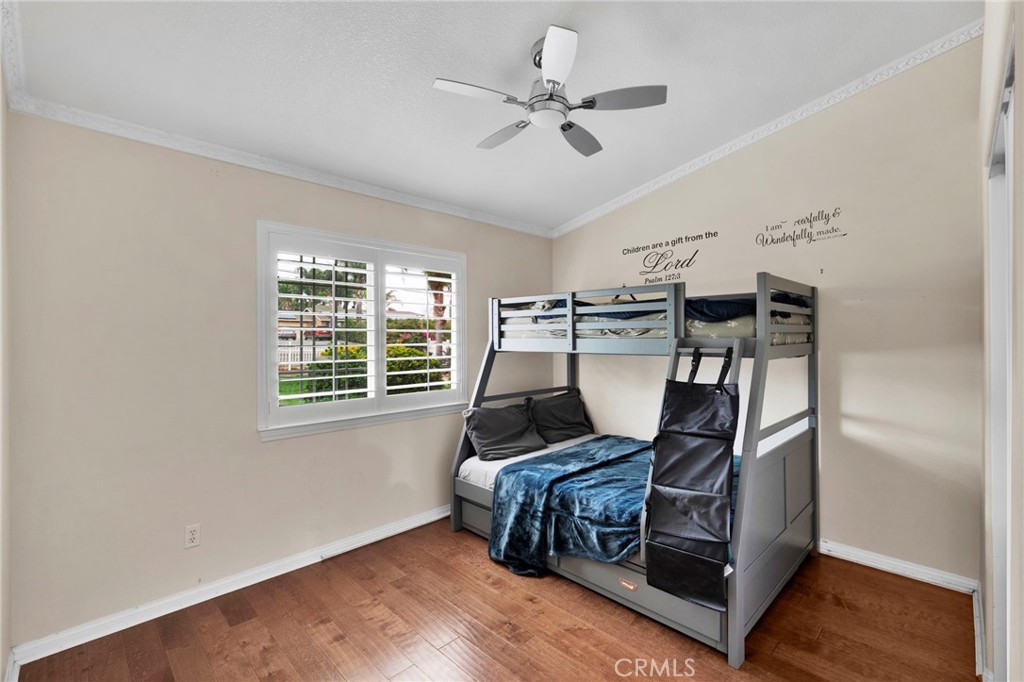 17777 Brazier Drive Riverside, CA 92508 - Photo 29 of 58 a bedroom with a bed and a window