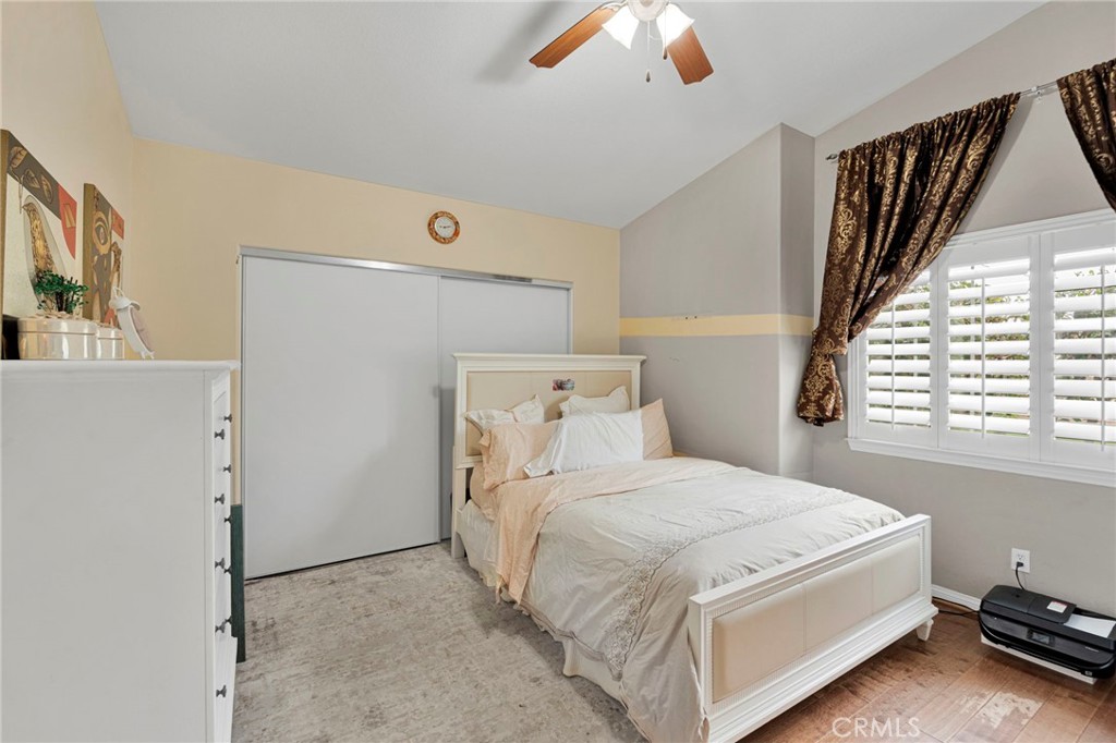 17777 Brazier Drive Riverside, CA 92508 - Photo 31 of 58 a bedroom with a bed and a window