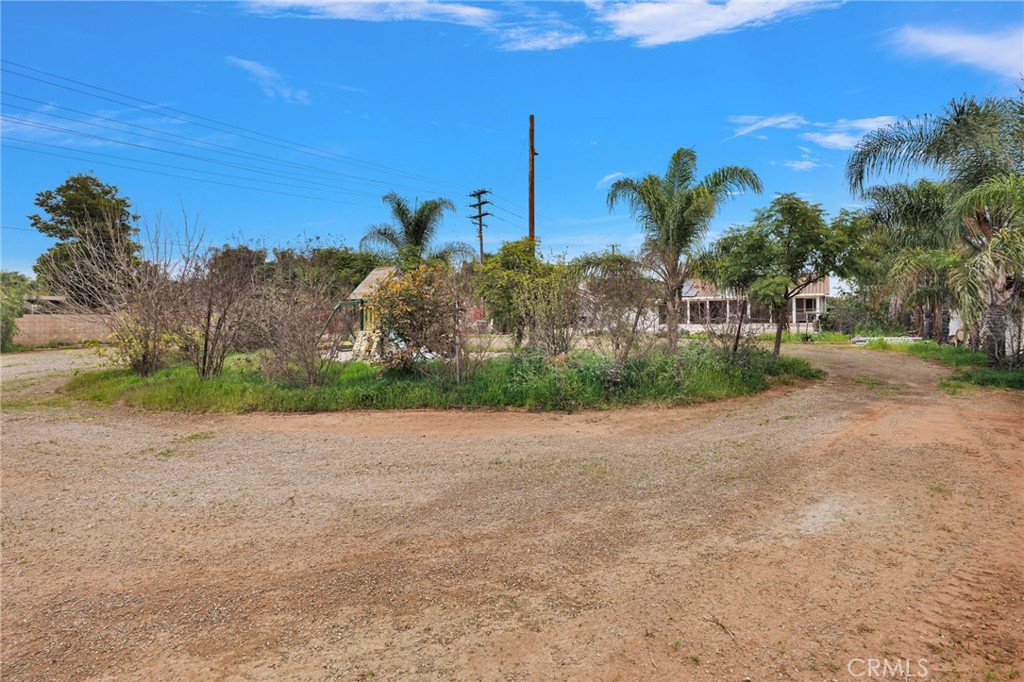 17777 Brazier Drive Riverside, CA 92508 - Photo 34 of 58 a view of a road with a building in the background