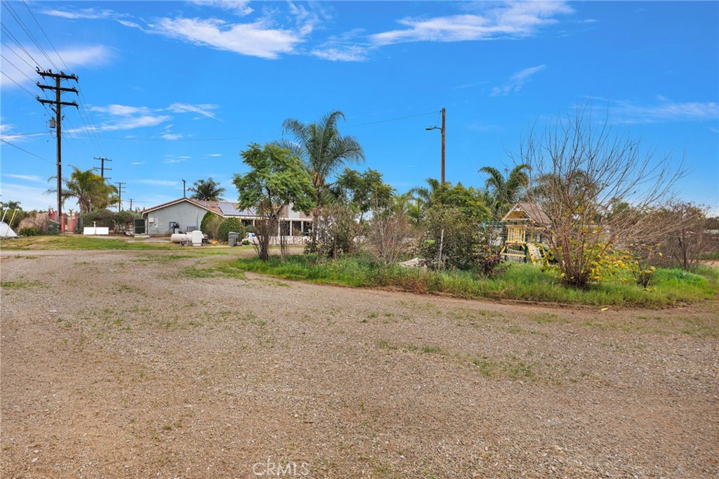17777 Brazier Drive Riverside, CA 92508 - Photo 35 of 58 a view of a road with a building in the background