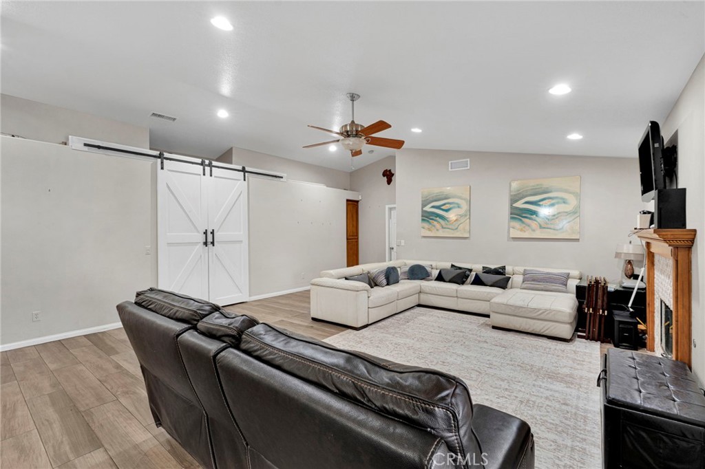 17777 Brazier Drive Riverside, CA 92508 - Photo 4 of 58 a living room with furniture and a flat screen tv