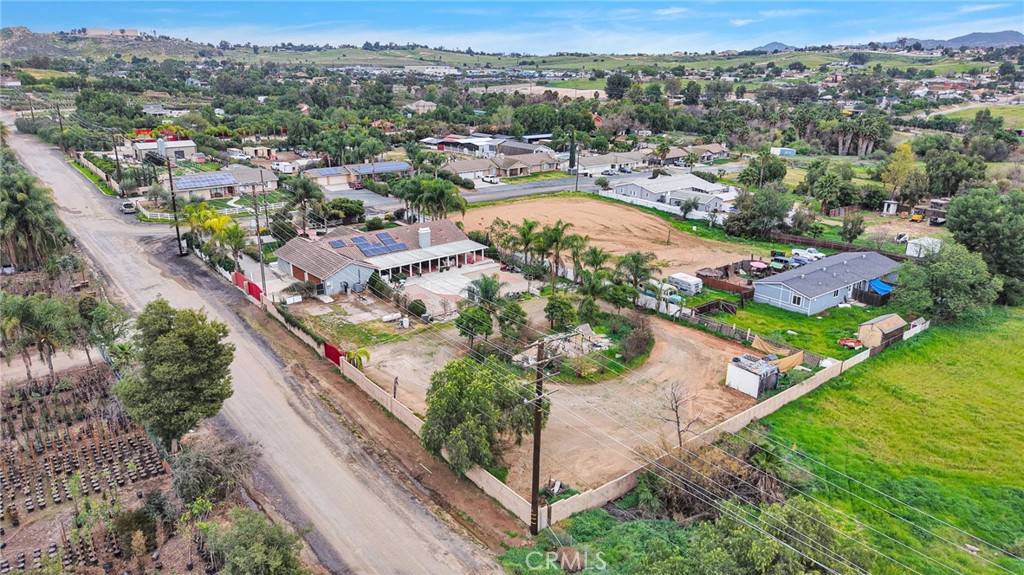 17777 Brazier Drive Riverside, CA 92508 - Photo 49 of 58 an aerial view of residential houses with outdoor space