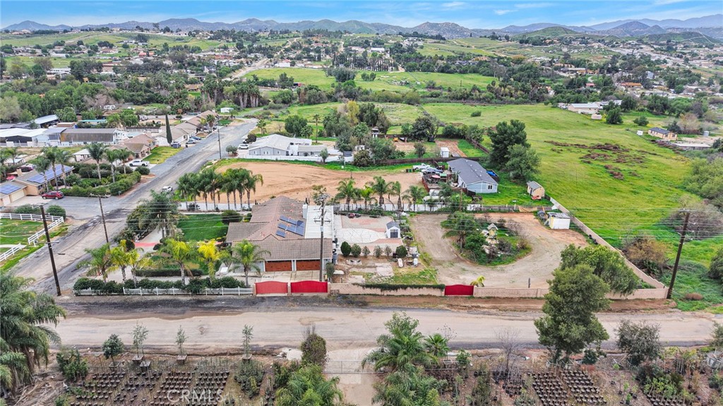 17777 Brazier Drive Riverside, CA 92508 - Photo 56 of 58 an aerial view of residential houses with outdoor space and parking