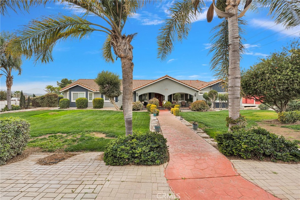 17777 Brazier Drive Riverside, CA 92508 - Photo 6 of 58 a front view of a house with garden