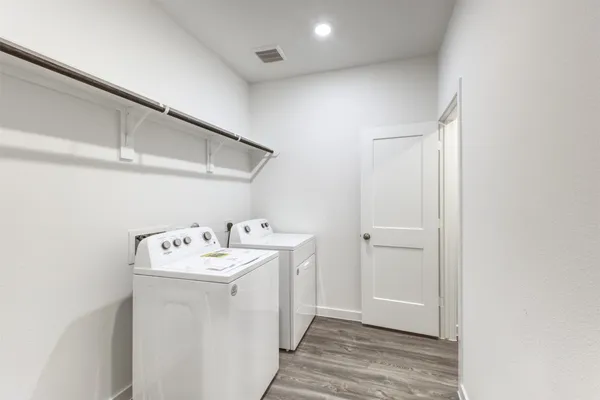 a utility room with dryer and washer