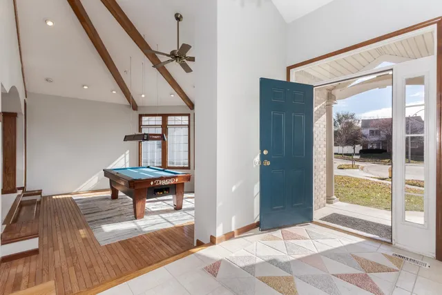 a bedroom with furniture and a window