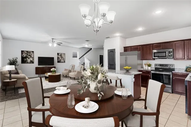 a view of a dining room with furniture