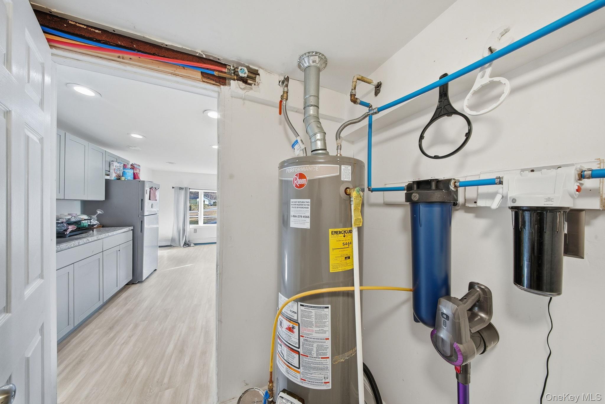 4 Old Road Cuddebackville, NY 12729 - Photo 12 of 17 a kitchen with stainless steel appliances granite countertop a sink cabinets and wooden floor