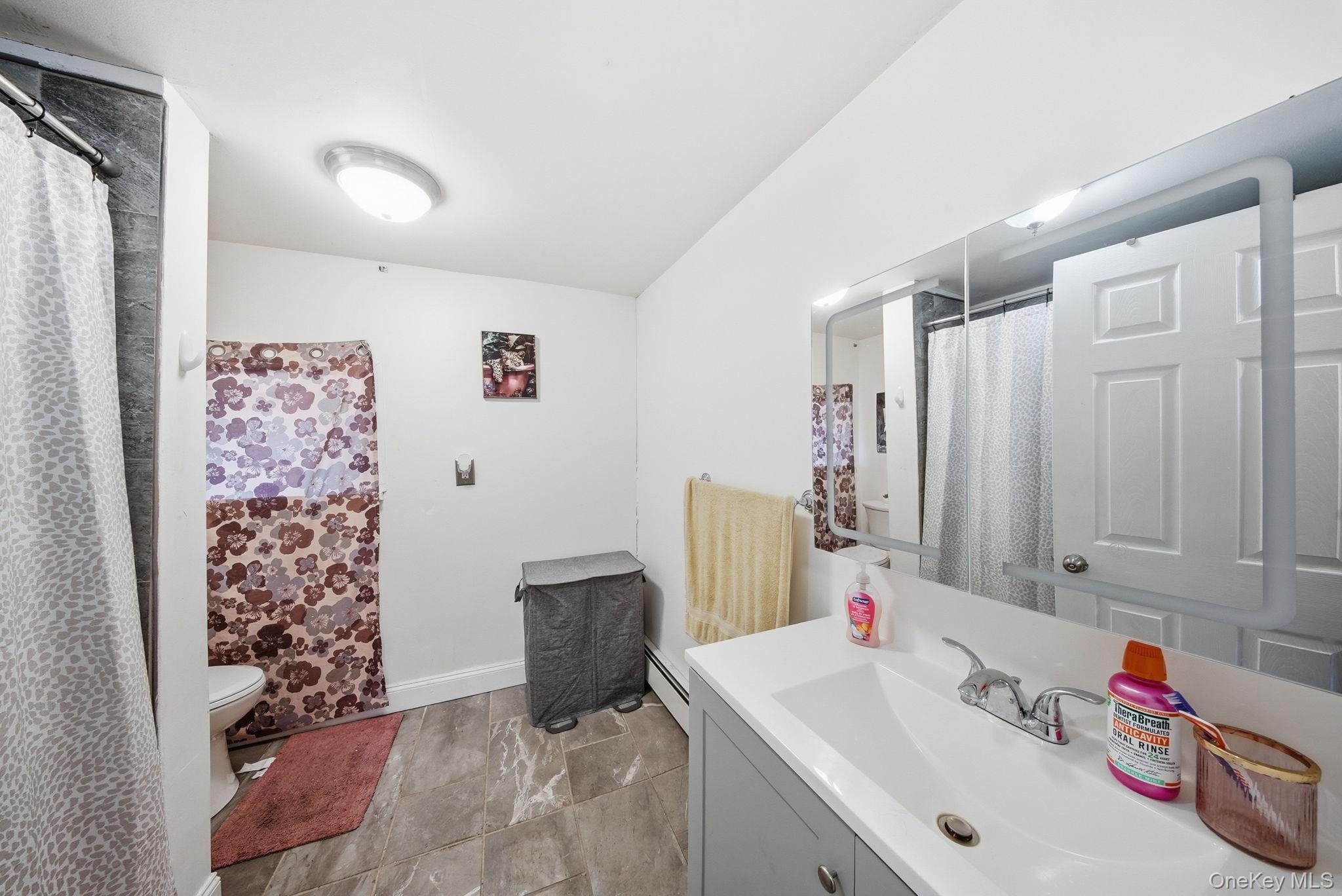 4 Old Road Cuddebackville, NY 12729 - Photo 13 of 17 a bathroom with a sink and a mirror
