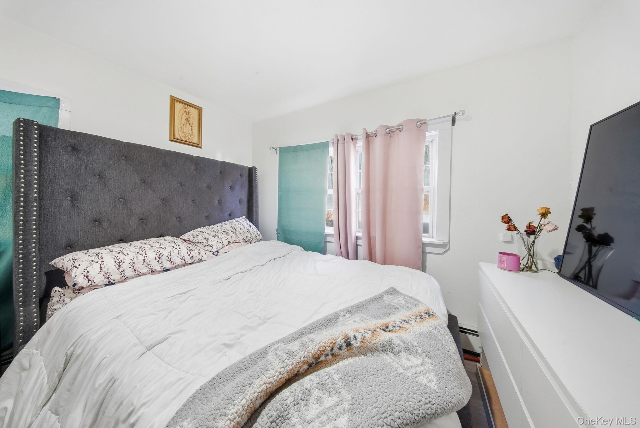 4 Old Road Cuddebackville, NY 12729 - Photo 16 of 17 a bedroom with a bed and a dresser