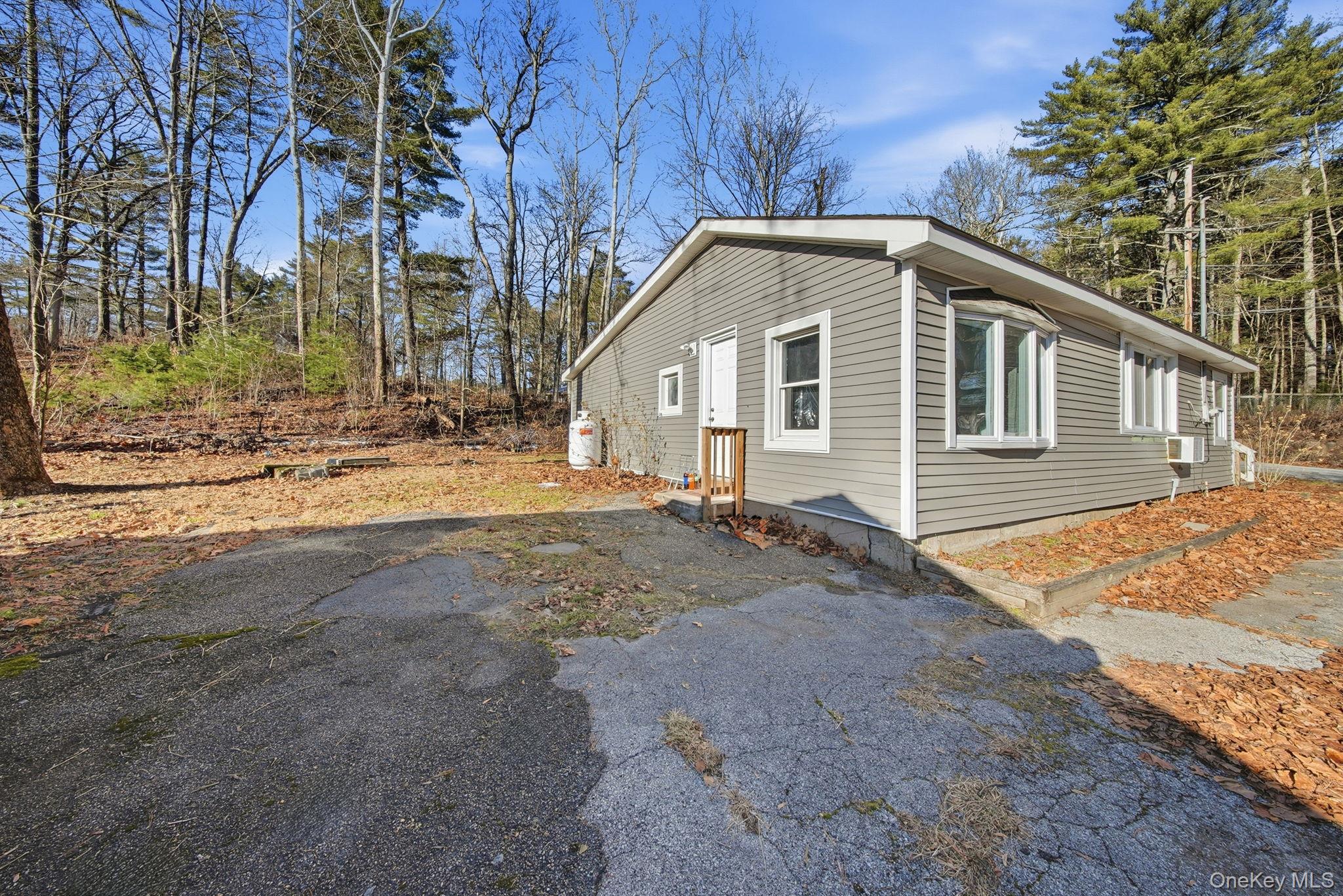 4 Old Road Cuddebackville, NY 12729 - Photo 17 of 17 a view of a house with snow on the road