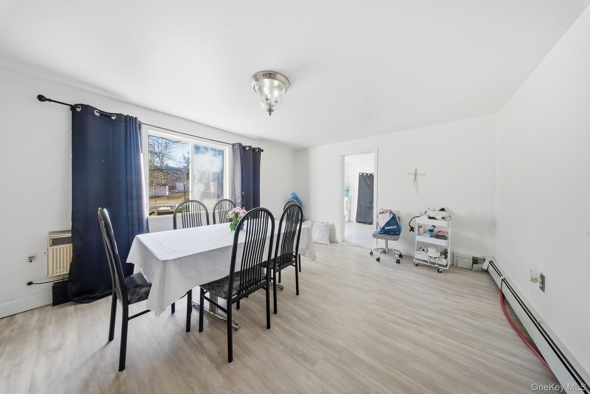 4 Old Road Cuddebackville, NY 12729 - Photo 3 of 17 a view of a a dining room with furniture window and wooden floor