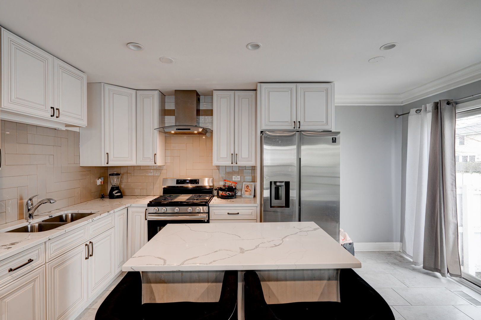 166 Williamsburg Road Country Club Hills, IL 60478 - Photo 4 of 15 a kitchen with a table chairs refrigerator and cabinets