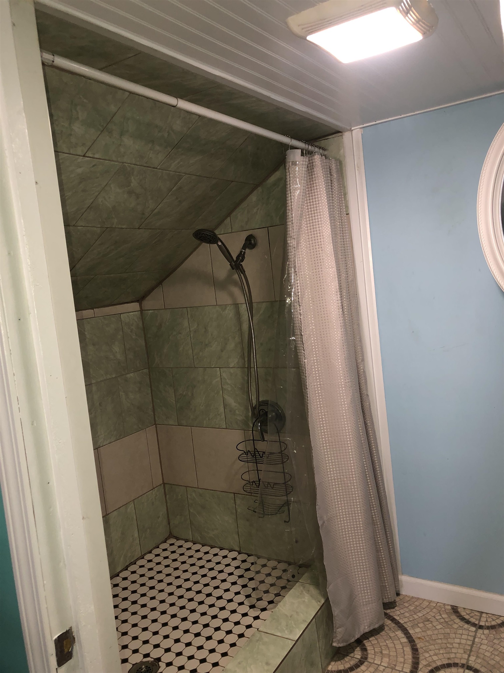 1441 Duke Road Memphis, TN 38122 - Photo 14 of 19 a bathroom with a shower and a toilet