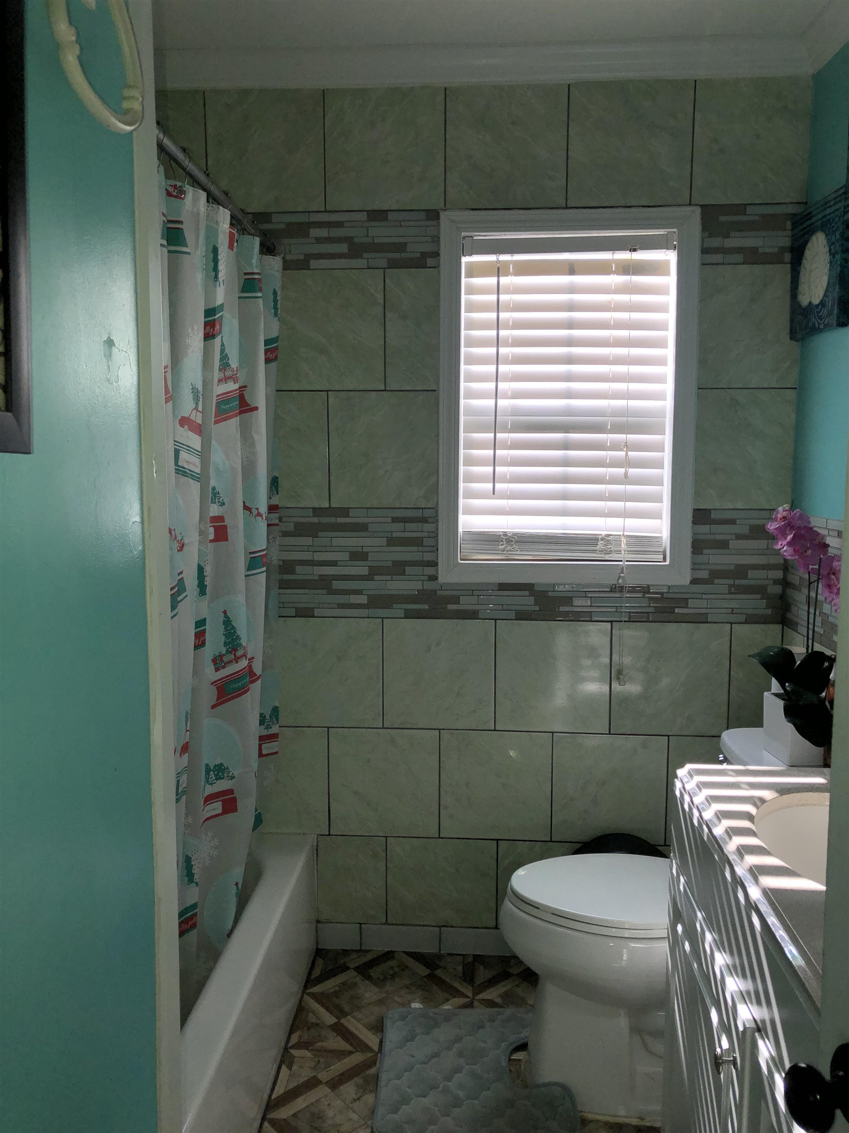 1441 Duke Road Memphis, TN 38122 - Photo 15 of 19 a bathroom with a toilet and shower
