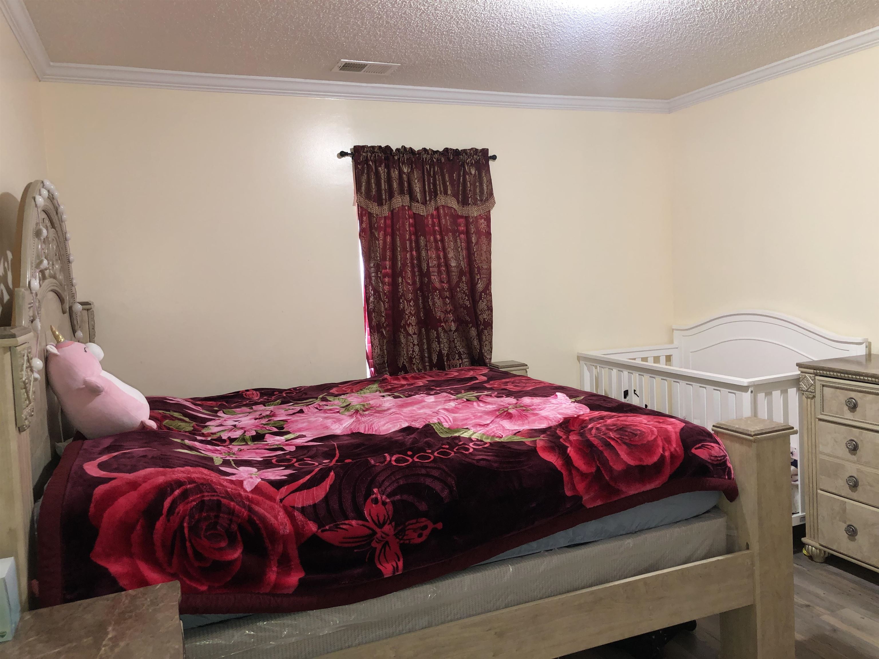 1441 Duke Road Memphis, TN 38122 - Photo 16 of 19 a bedroom with a bed and a closet