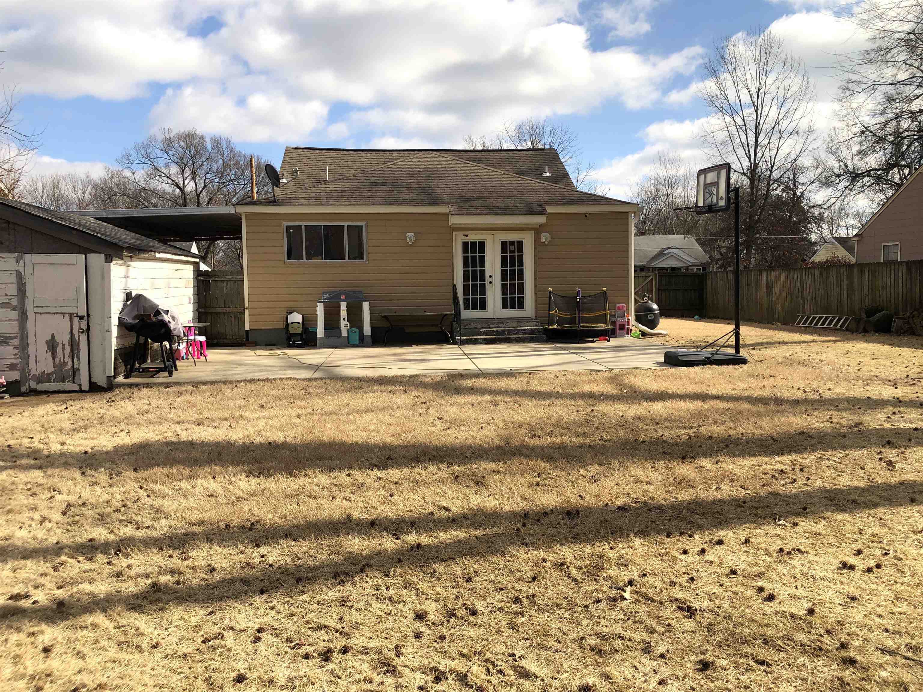 1441 Duke Road Memphis, TN 38122 - Photo 19 of 19 a view of a house with a patio