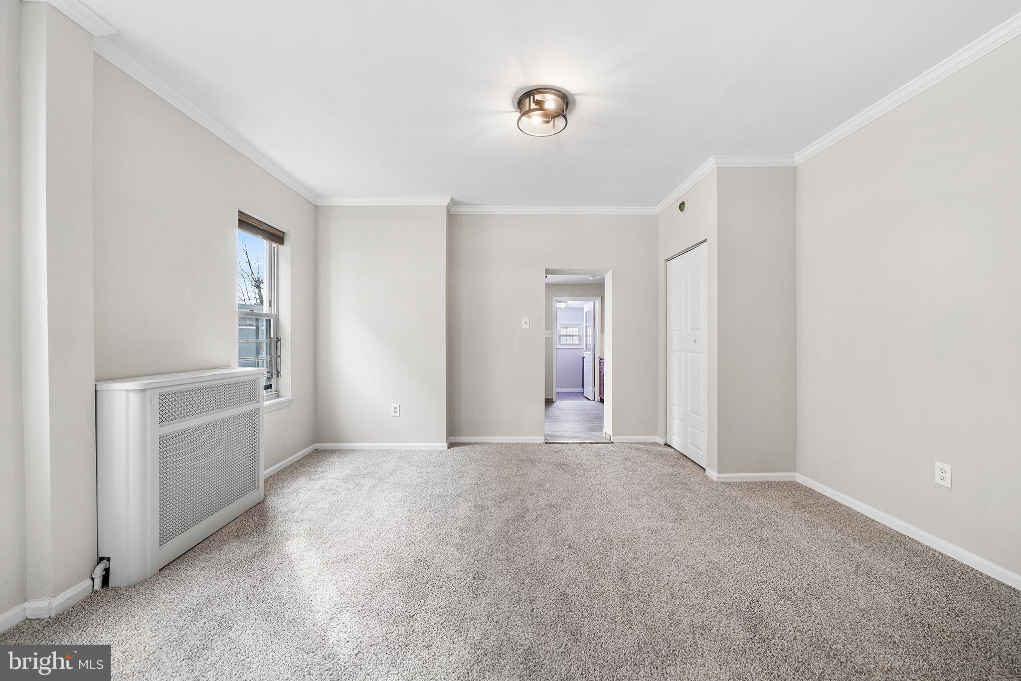 1006 Highland Avenue Chester, PA 19013 - Photo 11 of 29 a view of empty room with windows