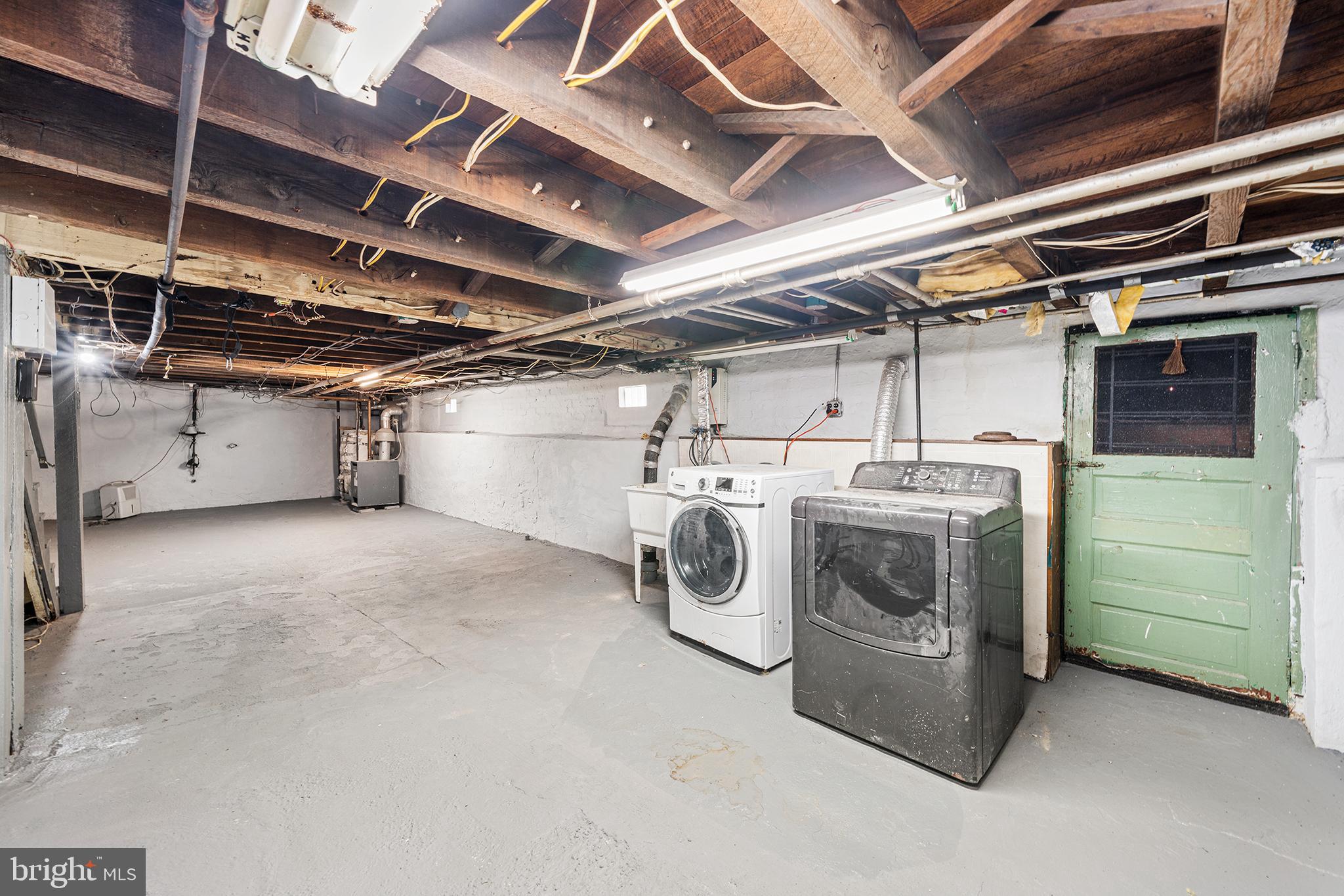 1006 Highland Avenue Chester, PA 19013 - Photo 25 of 29 a utility room with dryer and washer