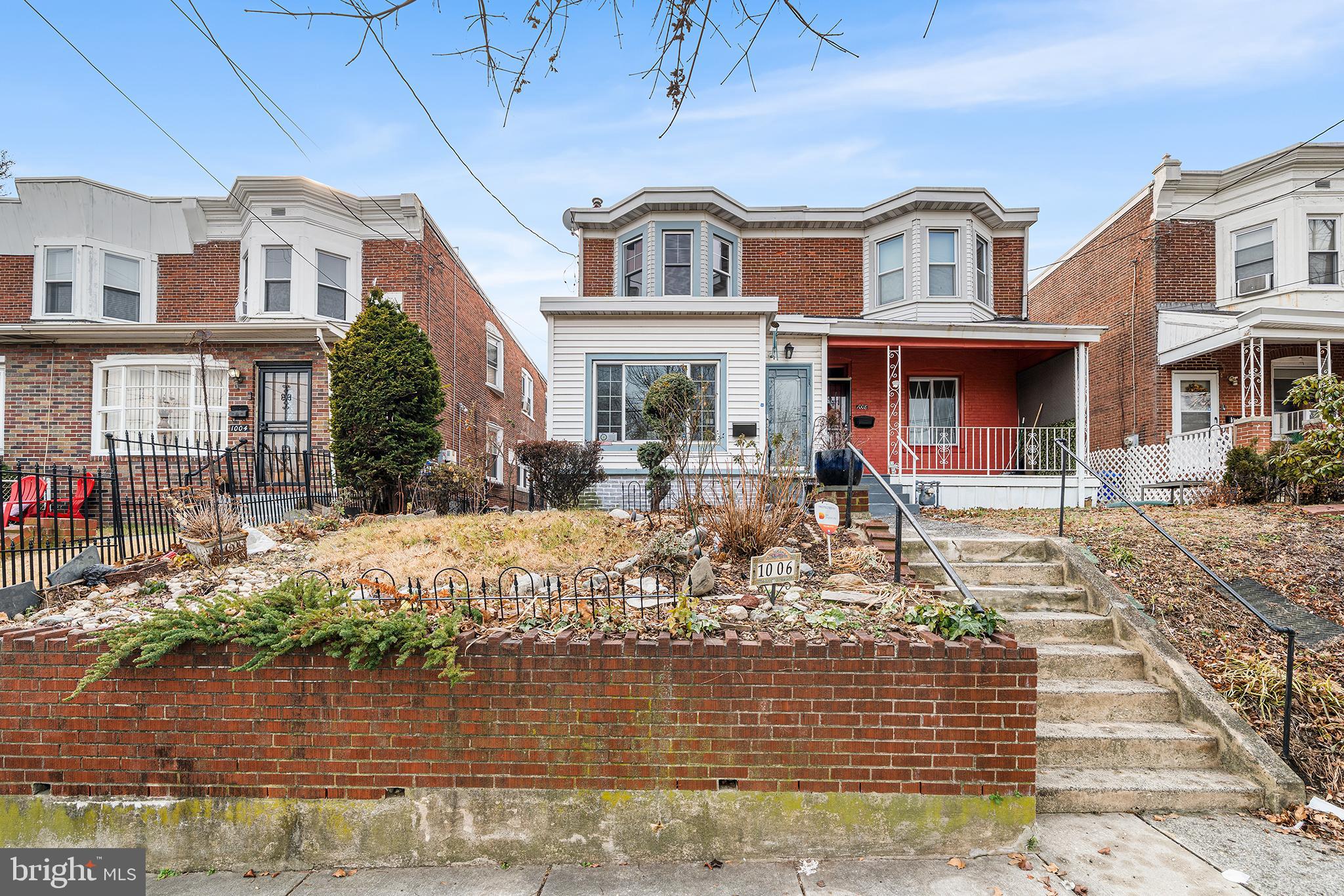 1006 Highland Avenue Chester, PA 19013 - Photo 3 of 29 a front view of a house with swimming pool