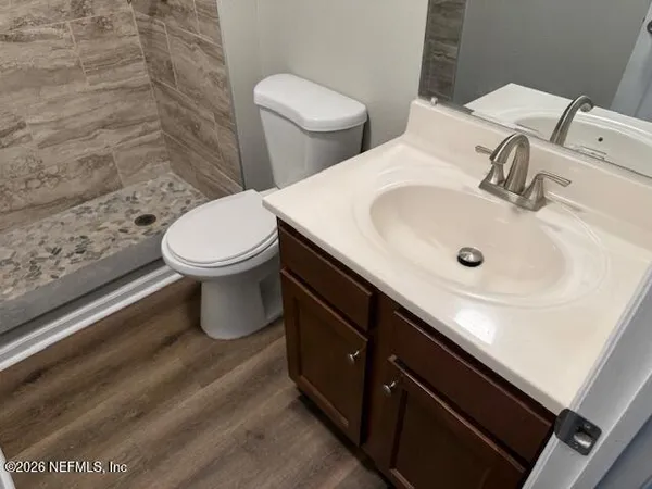 a bathroom with a sink and a toilet