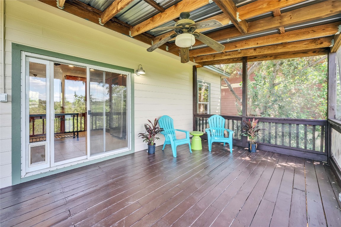 2108 Indian Creek Road Austin, TX 78734 - Photo 11 of 40 Wooden terrace featuring a ceiling fan