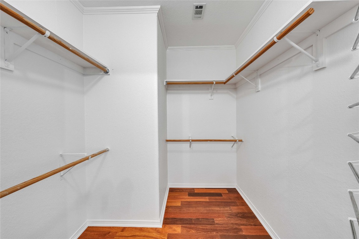 2108 Indian Creek Road Austin, TX 78734 - Photo 17 of 40 Spacious closet with dark wood-style flooring