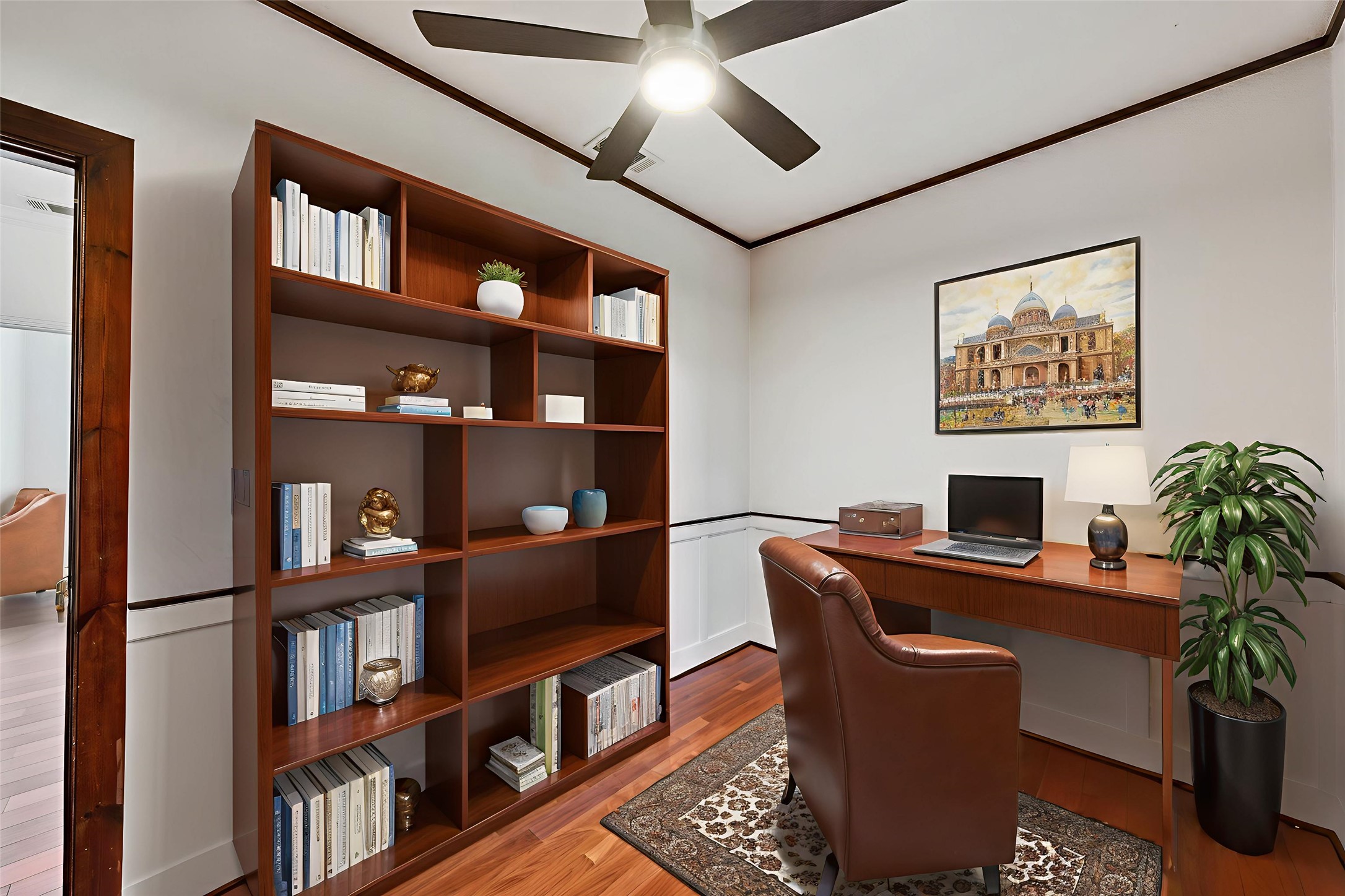 2108 Indian Creek Road Austin, TX 78734 - Photo 22 of 40 Office area with ornamental molding, light wood-style floors, ceiling fan, and built in study area