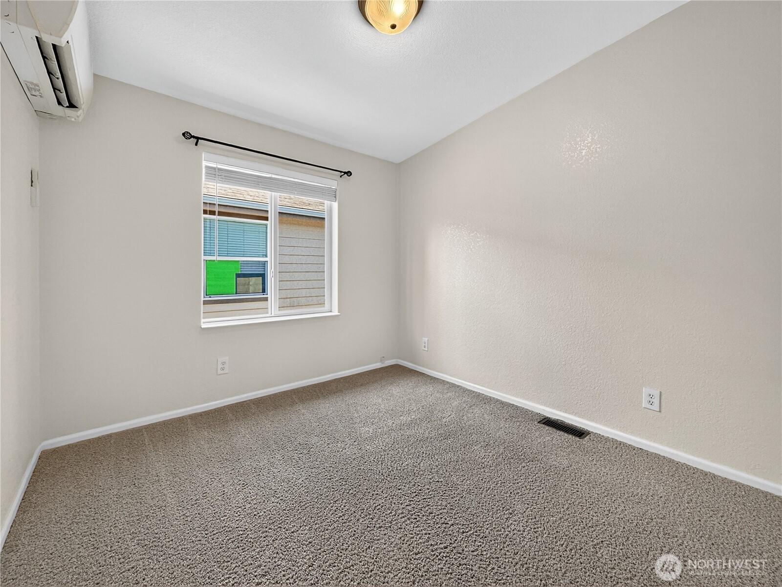 23825 15th Avenue Southeast, Unit 183 Bothell, WA 98021 - Photo 19 of 29 an empty room with windows
