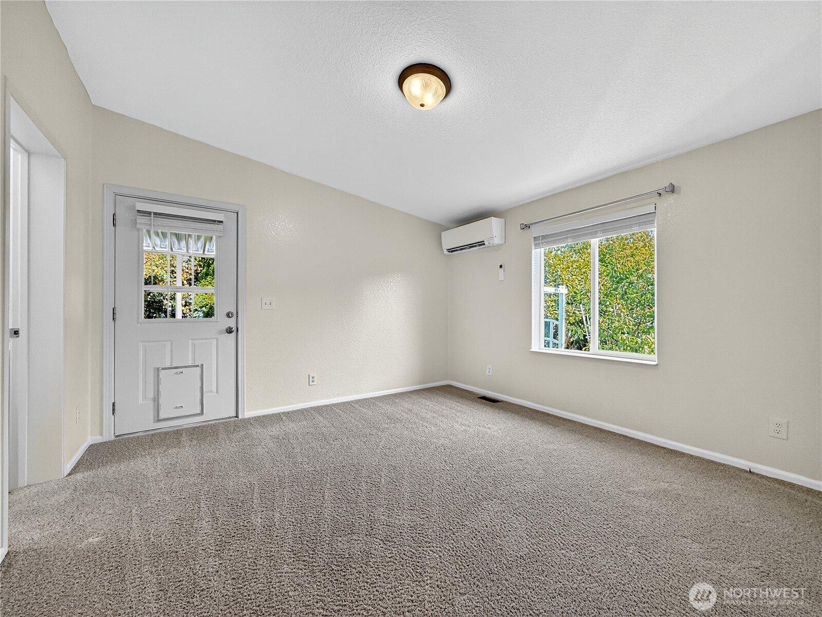 23825 15th Avenue Southeast, Unit 183 Bothell, WA 98021 - Photo 20 of 29 an empty room with windows and closet