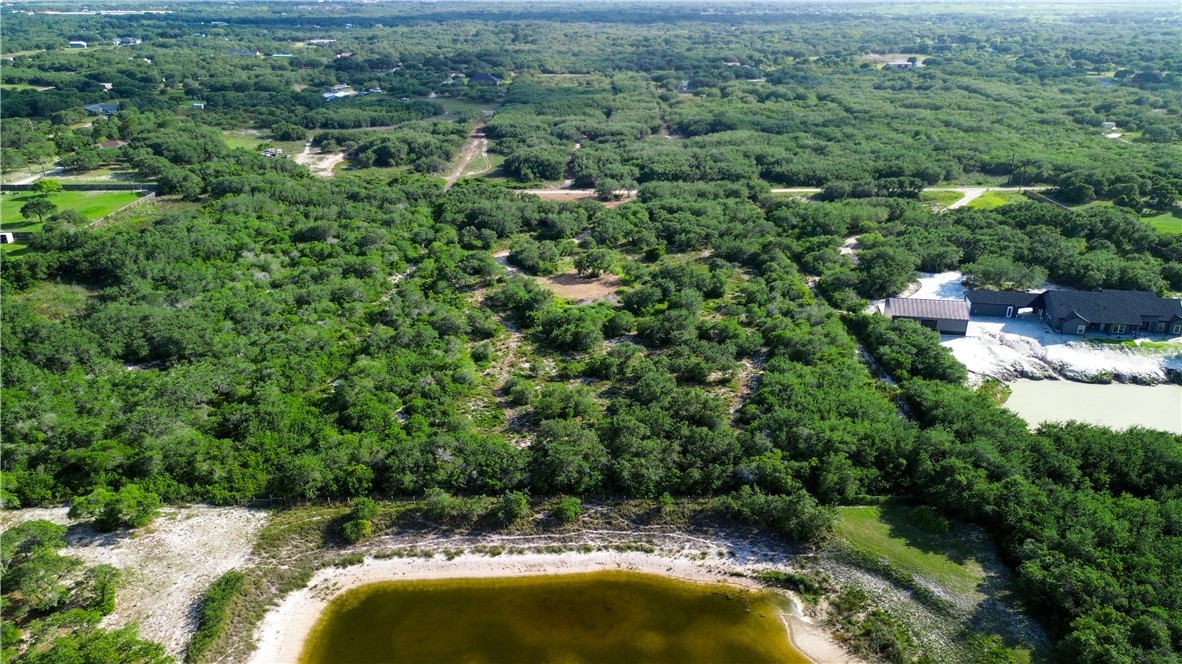 1508 Rhodes Avenue Aransas Pass, TX 78336 - Photo 5 of 30 back of property. (pond not on this property.)