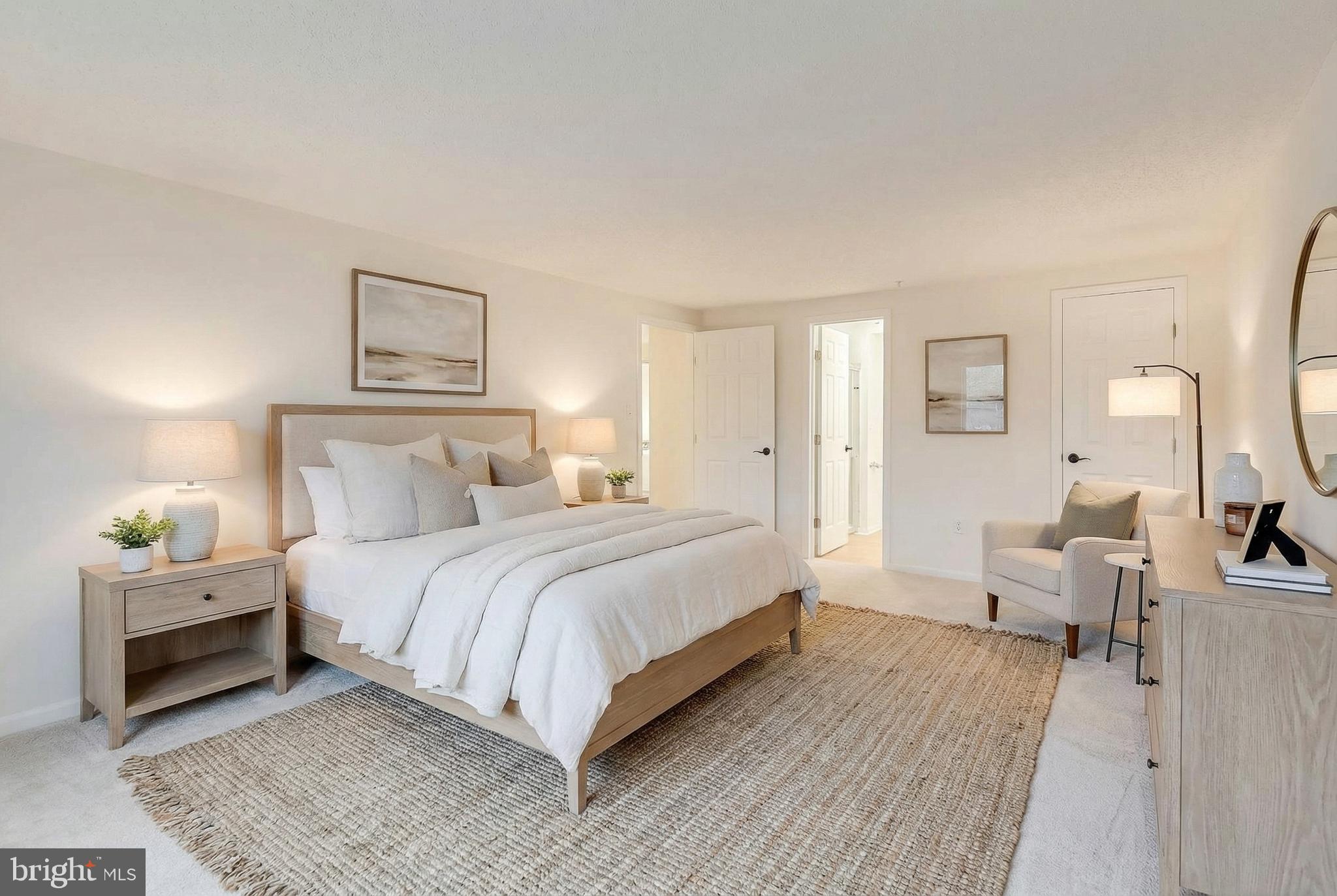 13107 Briarcliff Terrace, Unit 2204 Germantown, MD 20874 - Photo 17 of 30 a bedroom with a bed and wooden floor